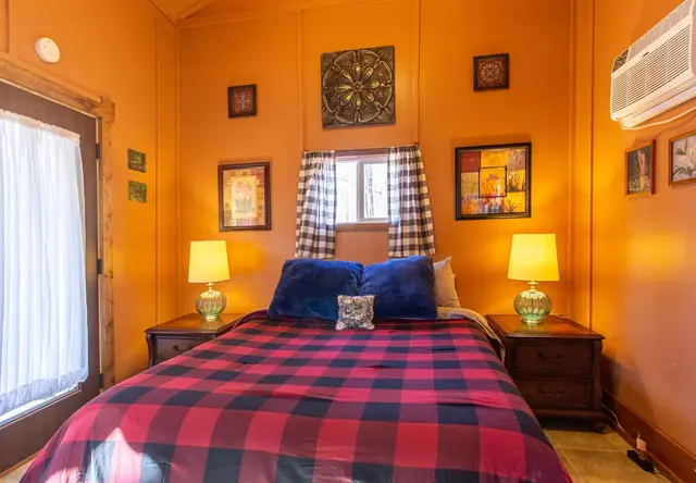 Cabin interior with queen bed