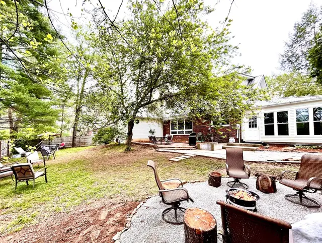 Backyard fire pit and stone patio