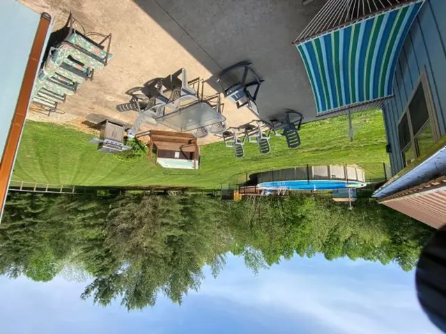 Patio with 33-ft pool and hot tub
